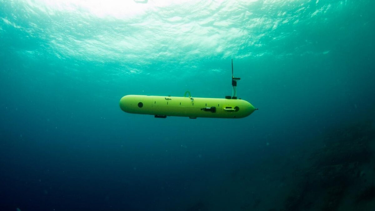 Autonomous underwater drone exploring ocean depths for subsea cable inspection