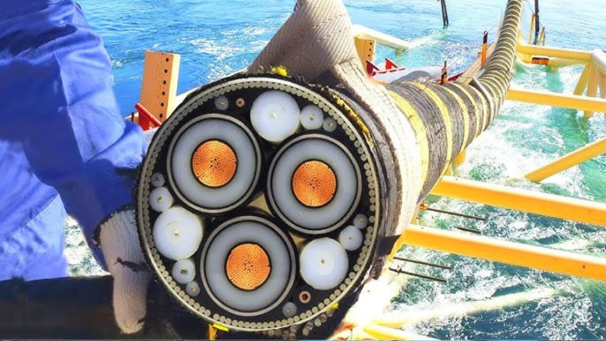 Close up of a large subsea cable cross section showing internal conductors during offshore installation.