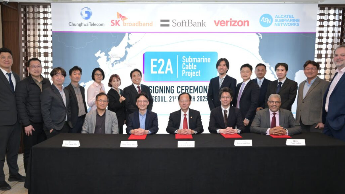 Consortium members pose at a subsea cable signing ceremony