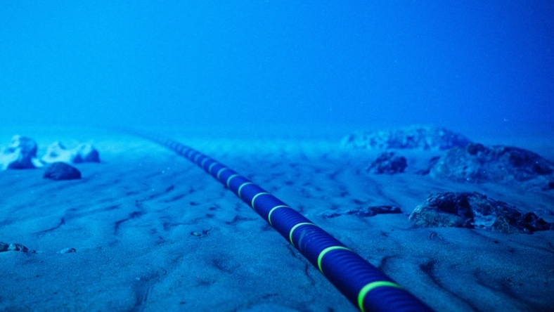 Submarine fibre optic cable laid across the ocean seabed