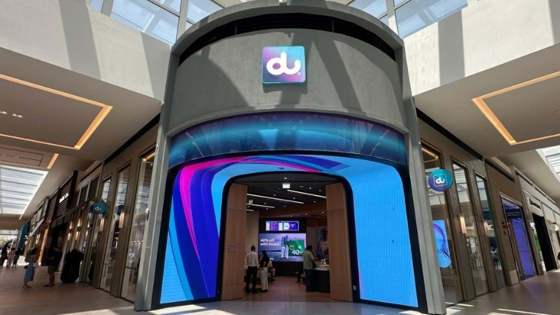 du branded telecom store entrance with digital display